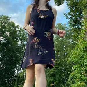 Cute hippie style sundress with butterfly designs.